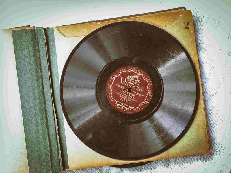 Old vinyl record in a faded case