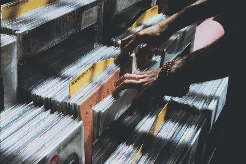 person looking through records