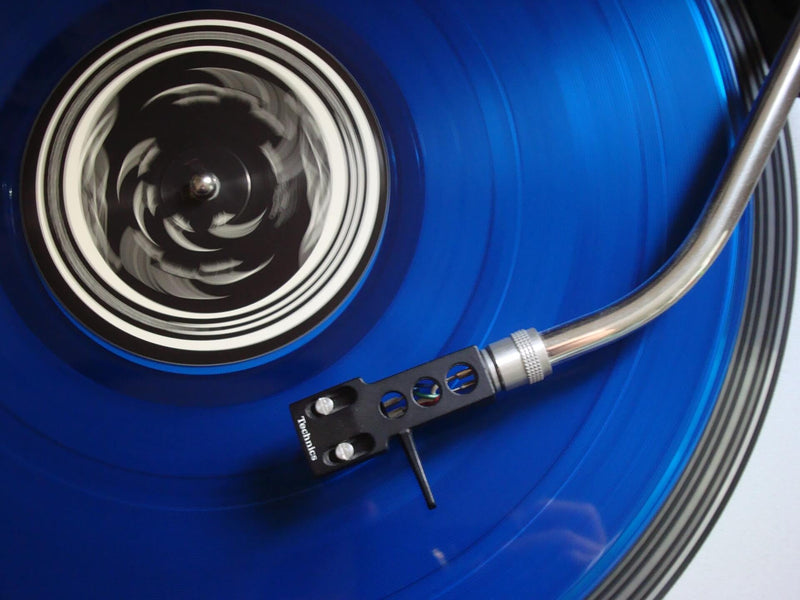 close-up of blue vinyl record on turntable