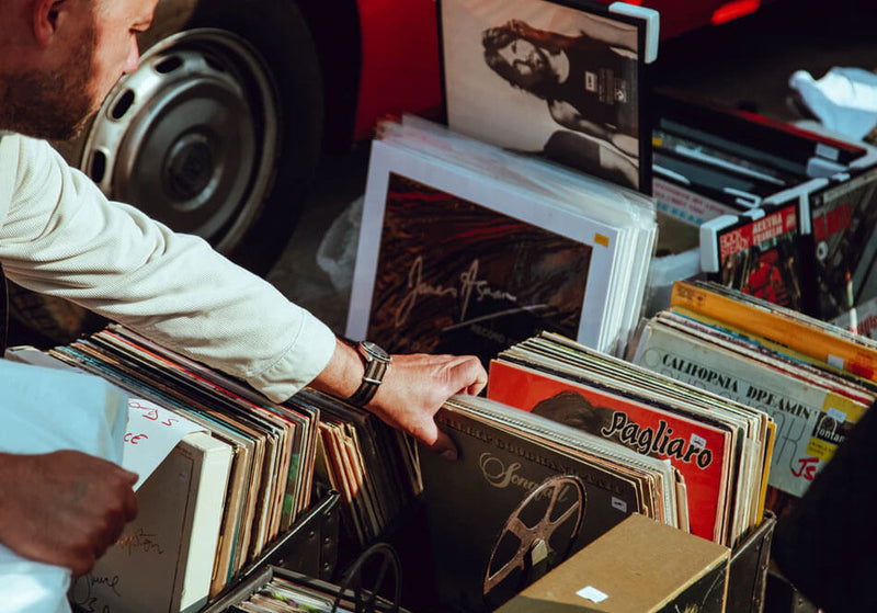 Man preparing vinyl record collection for moving