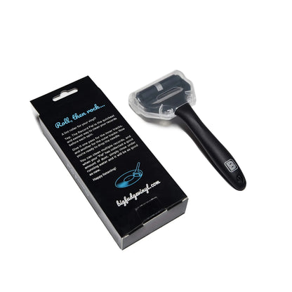 A black rolling tool with a clear protective cover, shown next to its black retail packaging box on a white background.