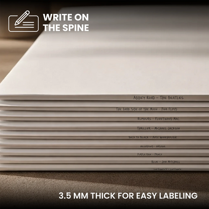 A stack of white 3.5 mm thick paper notebooks or journaling pads with printed song titles on the spines, shown with text overlays reading 'WRITE ON THE SPINE' and '3. _Glossy White