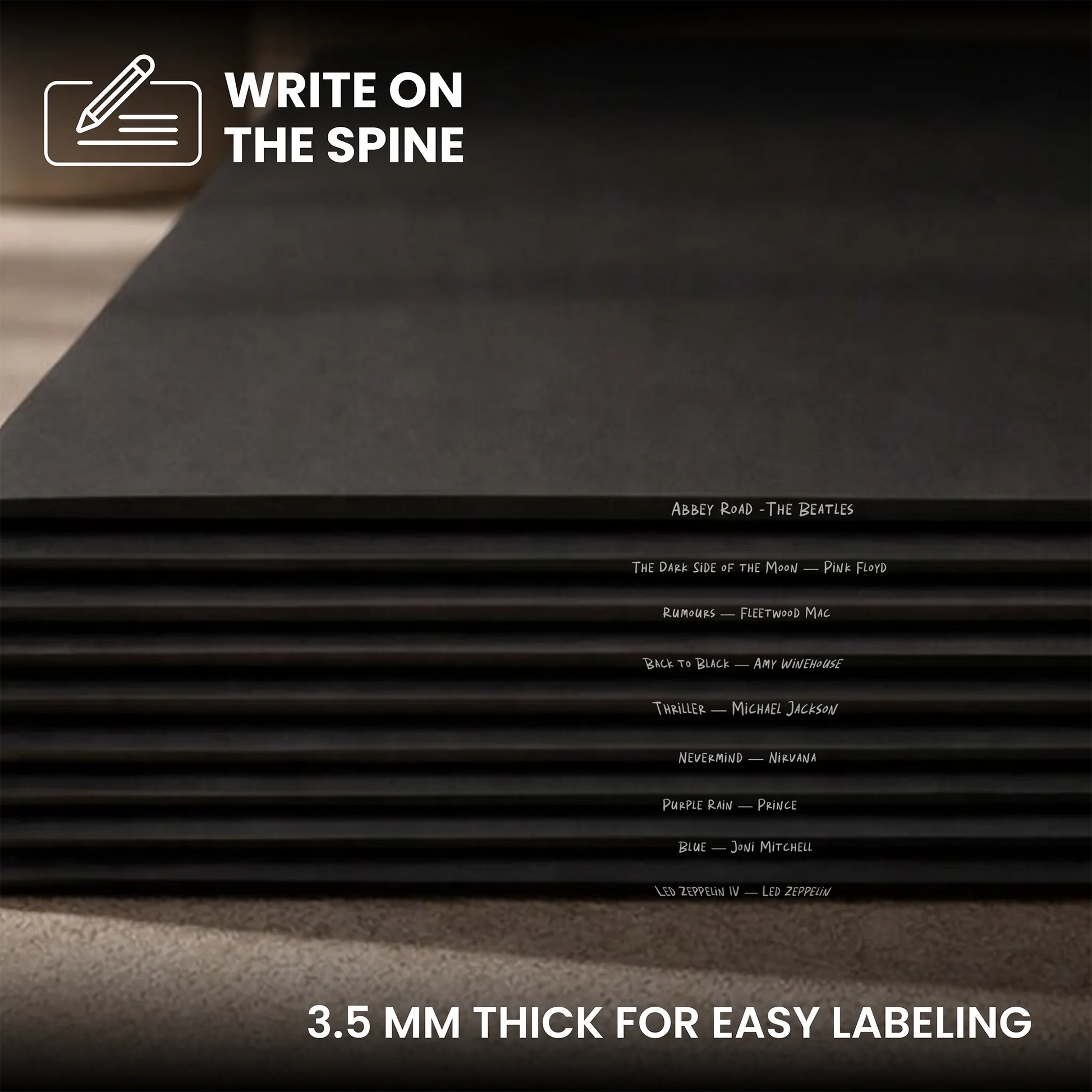 A stack of black writing boards shown at an angle, with text overlays reading 'WRITE ON THE SPINE' and '3.5 MM THICK FOR EASY LABELING'.  _Matte Black