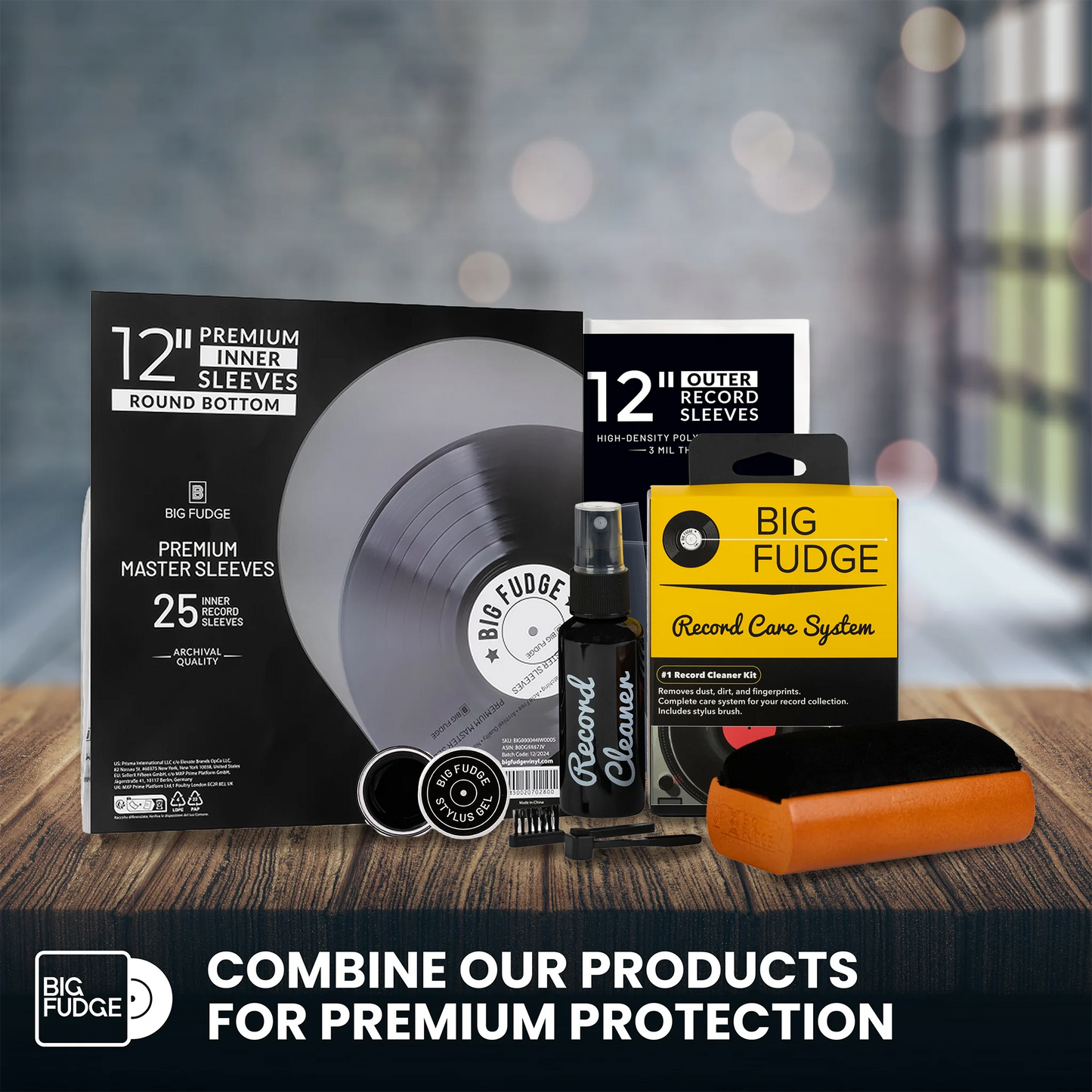 Collection of record care products including sleeves and cleaner on a wooden surface with a blurred background.