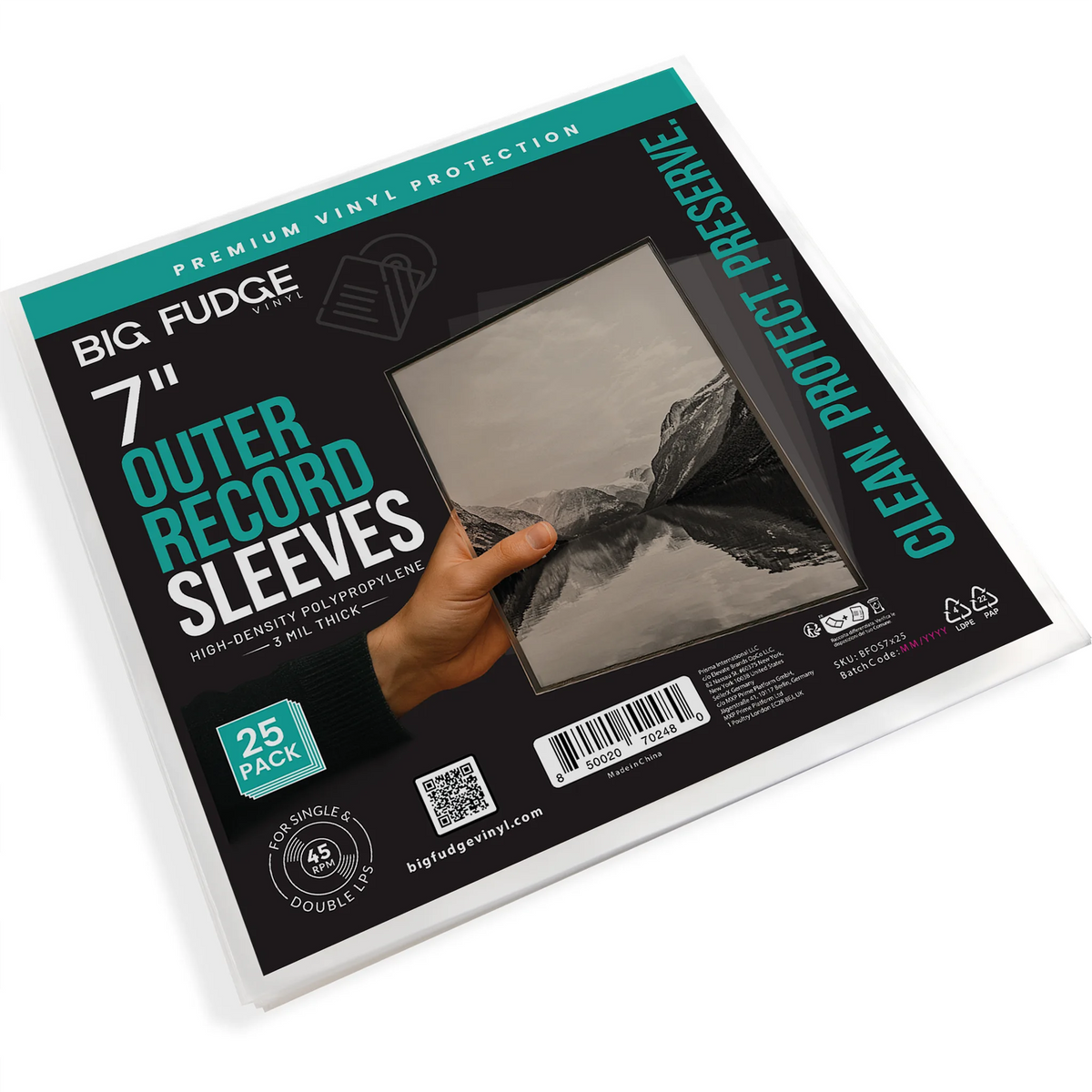 A package of Big Fudge 7-inch outer record sleeves, 25-pack, shown at an angle on a white background. The packaging is black with teal and white text, featuring a graphic of a hand holding a sleeve over a mountain landscape. _7 inch _25x pack