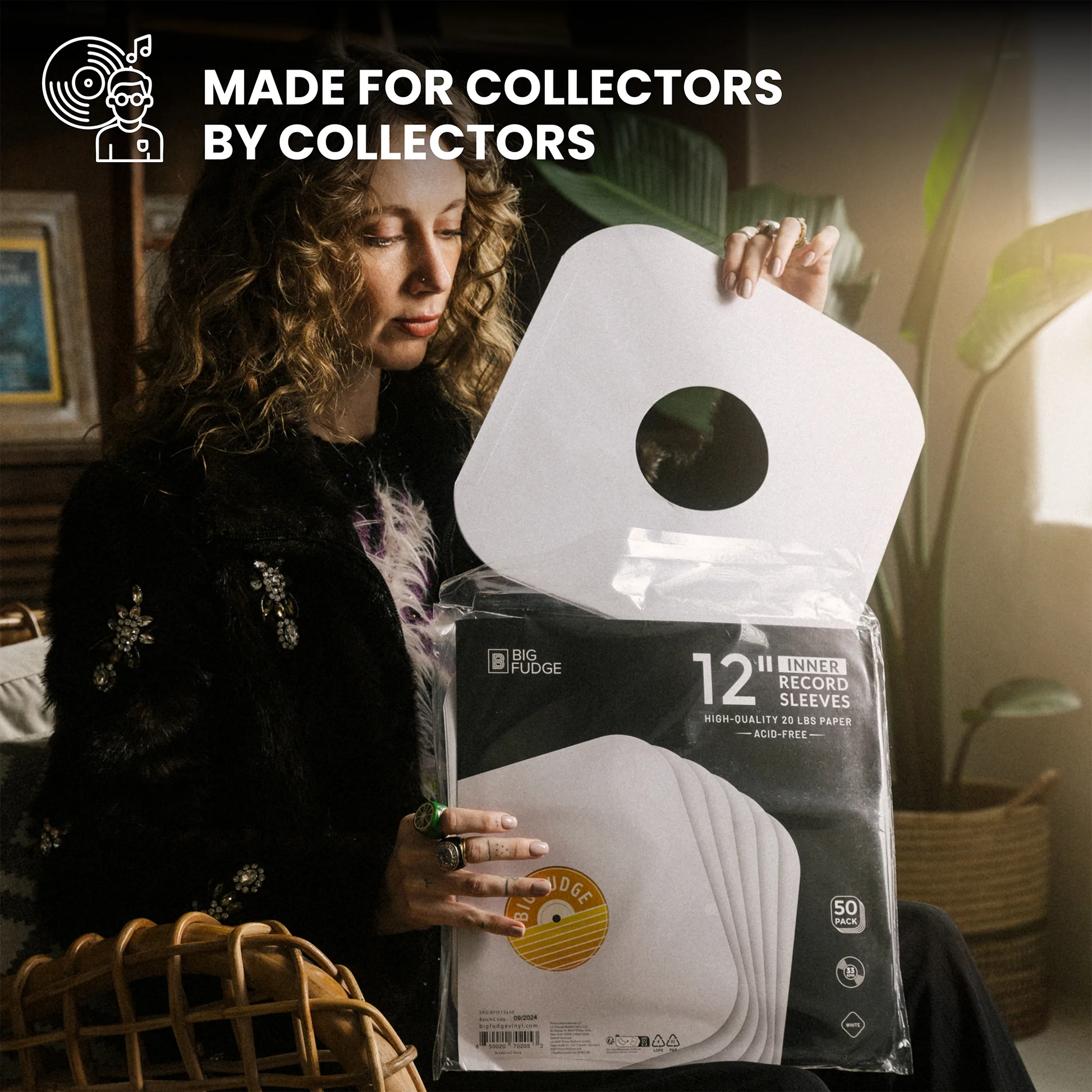 A woman holds an open clear plastic package of white vinyl record sleeves in a warm indoor setting. The package contains 12 record sleeves, and the top of the image includes the text 'MADE FOR COLLECTORS BY COLLECTORS' with a collector icon. _12 Inch